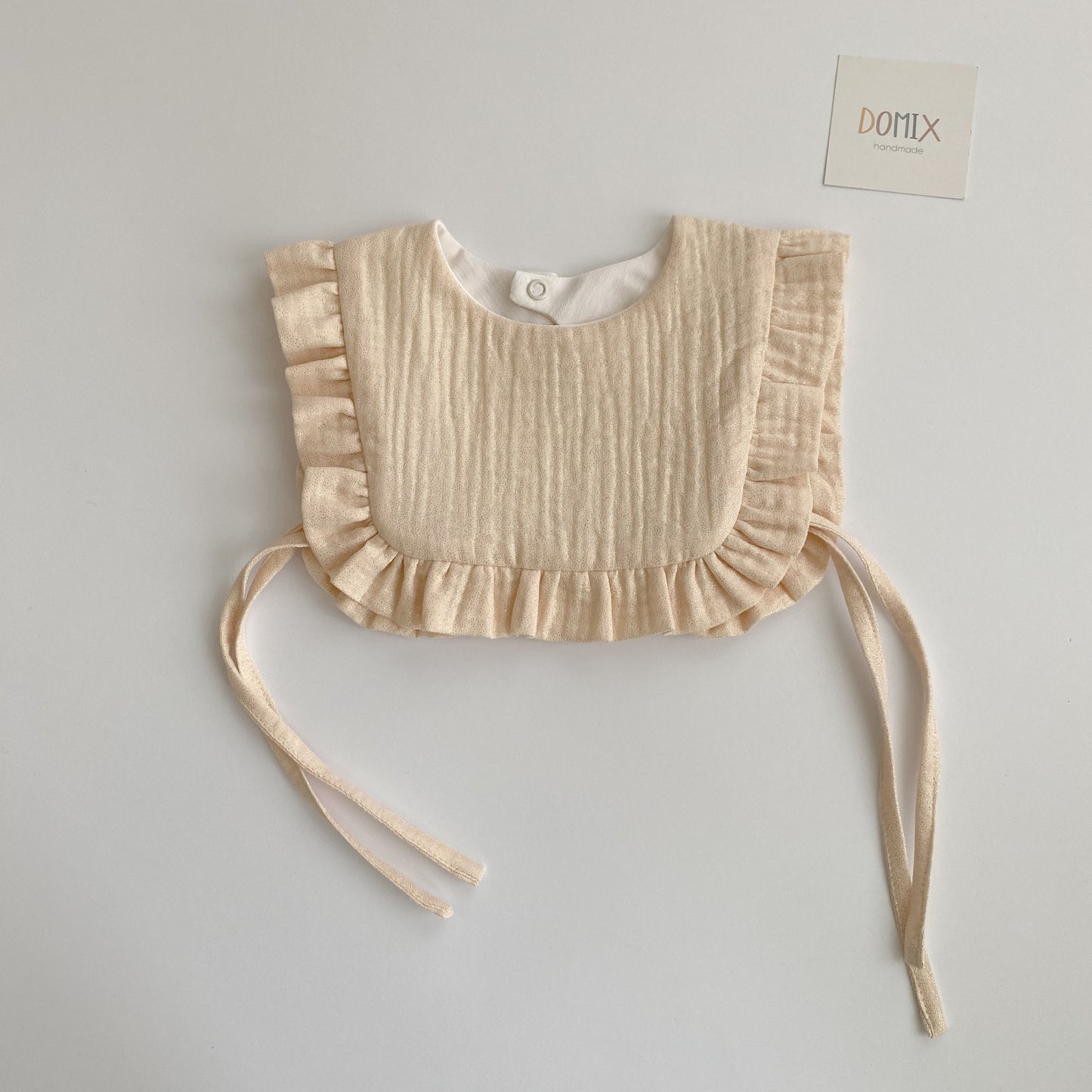 Shimmer Frill Bib